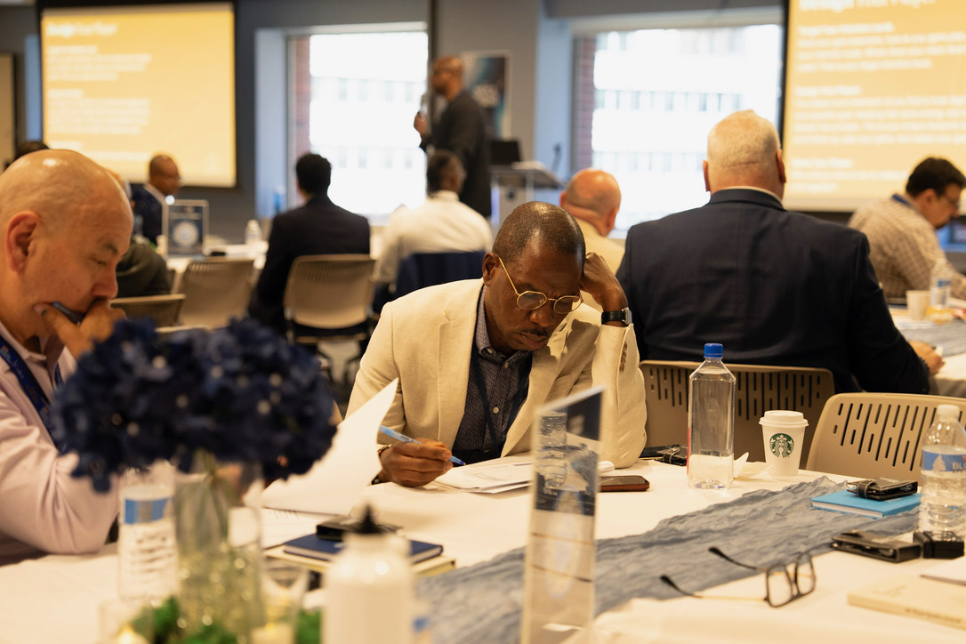 A participant taking notes during a ManUScript session
