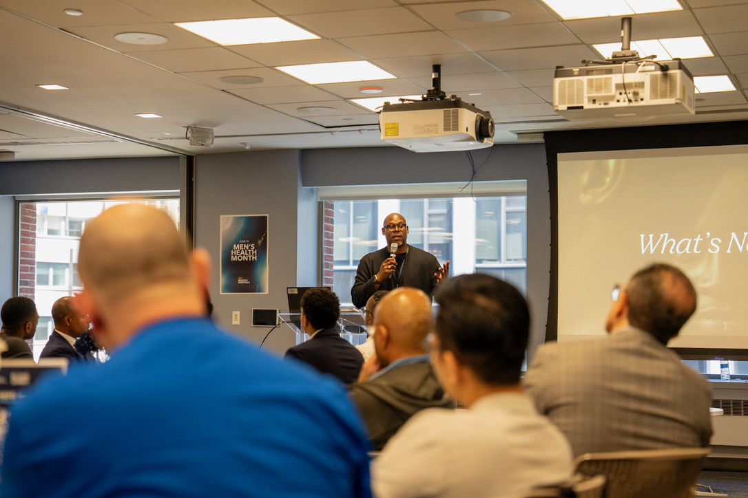 Jason delivering a keynote to a seated audience